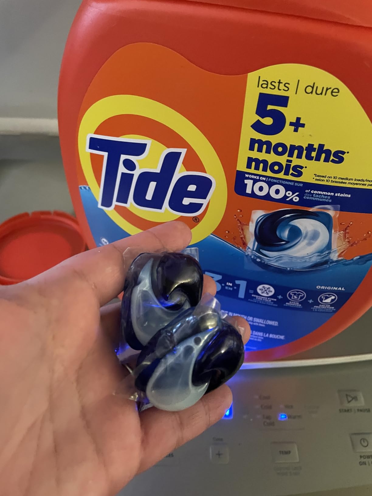 Tide PODS laundry detergent pacs, 3-in-1 Stain Remover, Odor Fighter, Color Protector, 57 Count, HE compatible, Clean Breeze Scent - Customer Photo 1