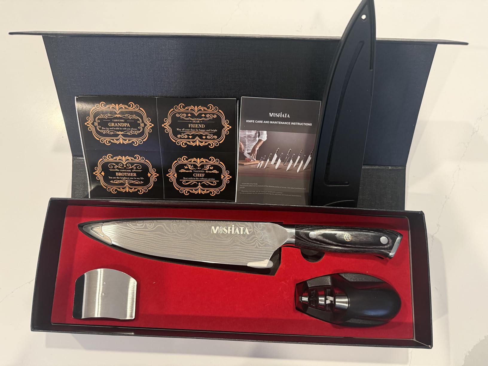 MOSFiATA Santoku Knife- 7 Inch Vegetable Knife Ultra Sharp Chopping Knife- Forged EN.4116 German Steel- Including Sheath, Finger Guard, Knife Sharpener, Full Tang, Best Gifts with Handmade Gift Box - Customer Photo 1
