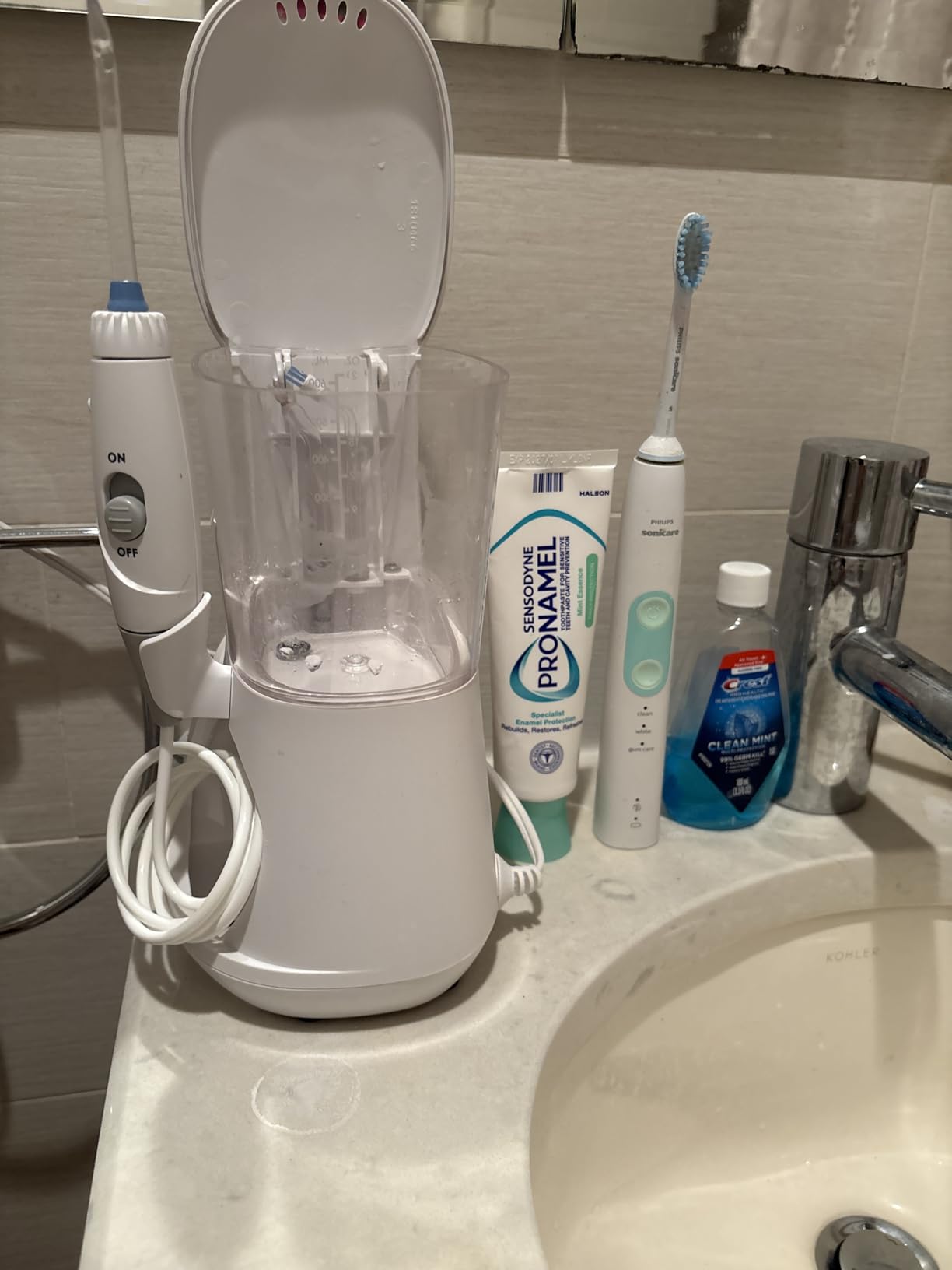 Waterpik Aquarius Water Flosser For Teeth Cleaning, Gums, Braces, Dental Care, Electric Power With 10 Settings, 7 Tips For Multiple Users And Needs, ADA Accepted, Gray WP-667 customer photo 1