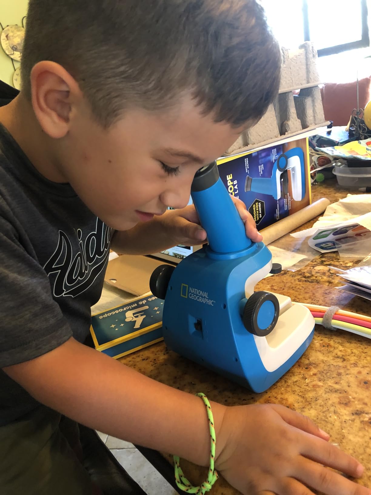 National Geographic Junior Microscope for Kids- Kit Includes Up to 250x Magnification Handheld Mini Attachment, 12 Slides, Lab Guide, Science Toy for Ages 6-12, STEM Project customer photo 1
