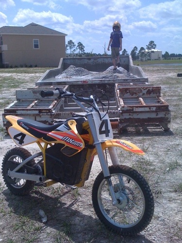 Razor MX650 Dirt Rocket Bike Electric Ride-On for Ages 16+, 220 lb Max Weight, Orange - 36V Battery, Up to 17 Mph, 40-Min Run Time, Twist-Grip Throttle, 16