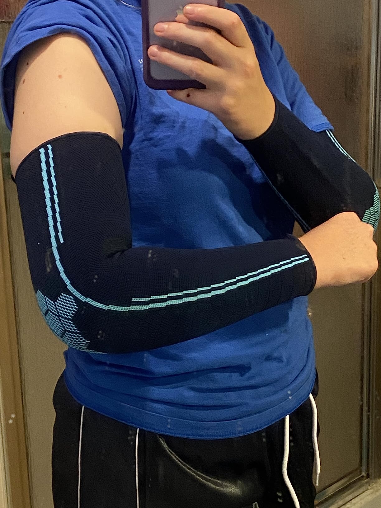Sparthos Arm Compression Sleeves - Arms Brace for Recovery, Support for Athletic Sports Running Tennis Baseball Lifting Volleyball Shooting Weightlifting Golf - for Men and Women (Black-M) customer photo 1