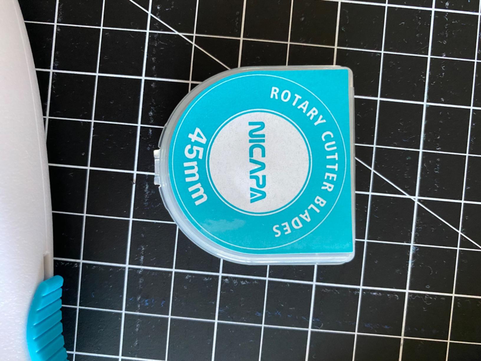 NICAPA 45mm Rotary Cutter for Fabric with Safety Lock Ergonomic Classic Comfort Loop Rotary Cutter (Extra 5pcs Replacement Blades Included) customer photo 2