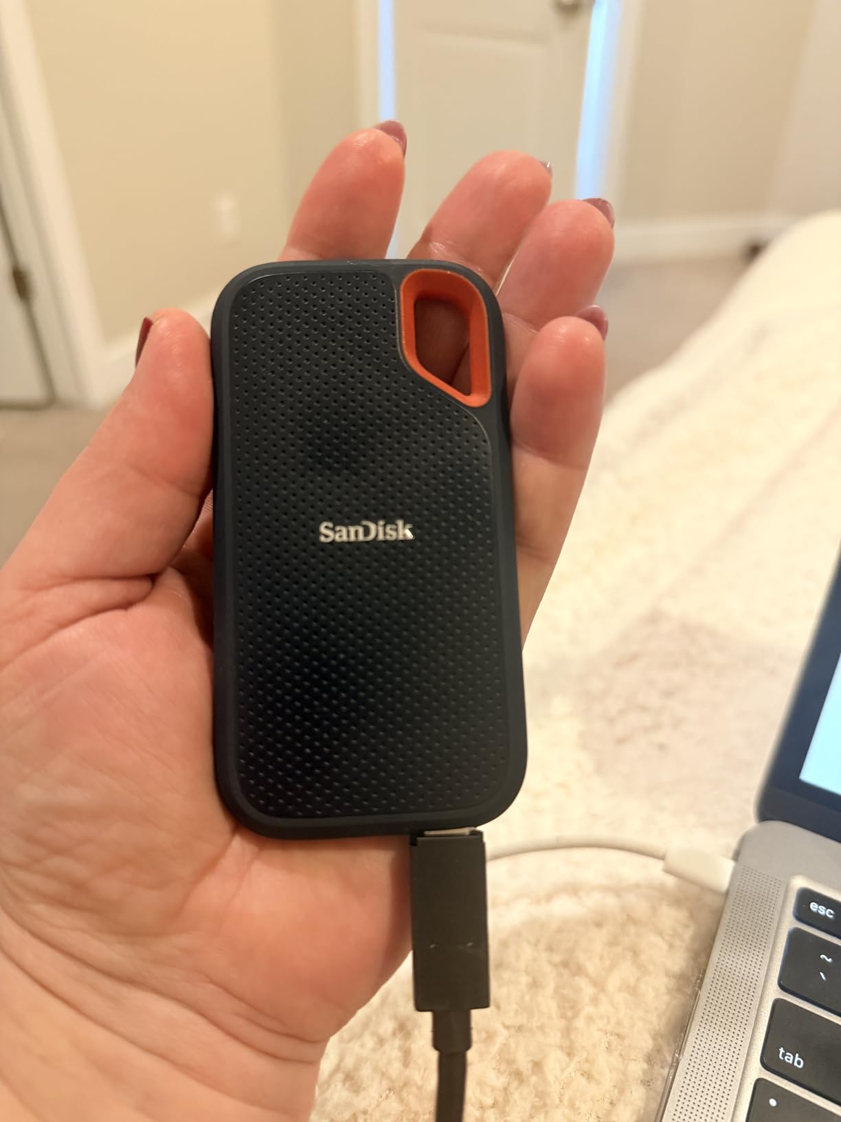 SANDISK 1TB Extreme Portable SSD - Up to 1050MB/s, USB-C, USB 3.2 Gen 2, IP65 Water and Dust Resistance, Updated Firmware - External Solid State Drive - SDSSDE61-1T00-G25 customer photo 2