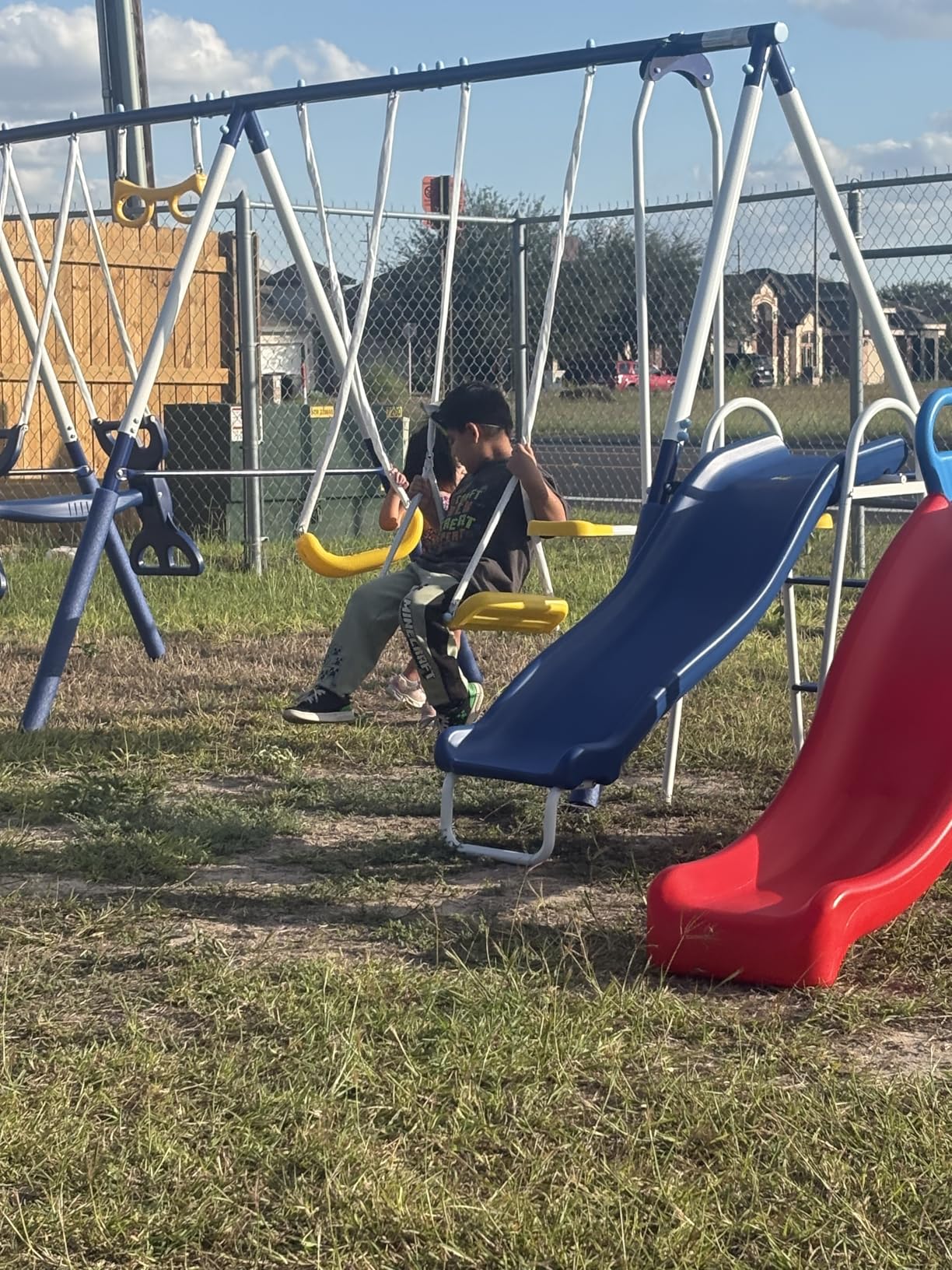 Sportspower Super 9 Metal Swing Set for Outdoor Backyard Play: Teeter Totter, Glide Ride, Roman Glider, Standing Swing, Trapeze, 5ft Slide, Anchor Kit, 7.5' D x 17.1' W x 6.1' H customer photo 1