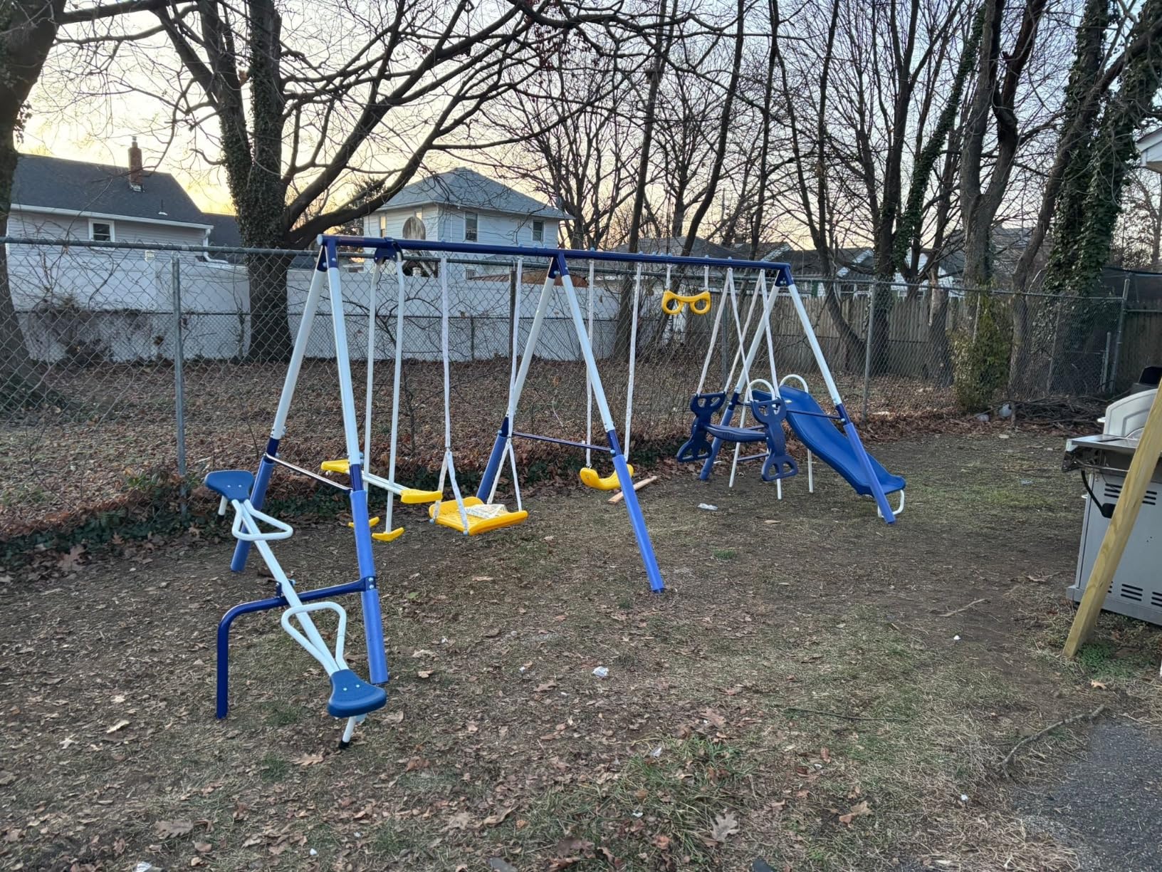 Sportspower Super 9 Metal Swing Set for Outdoor Backyard Play: Teeter Totter, Glide Ride, Roman Glider, Standing Swing, Trapeze, 5ft Slide, Anchor Kit, 7.5' D x 17.1' W x 6.1' H customer photo 2