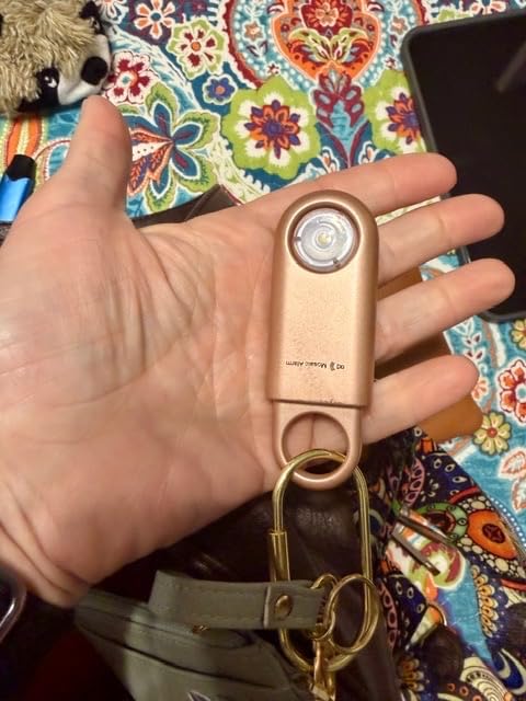 130dB Personal Safety Alarm Ultra Bright Strobe Light. Loud Sound Keychain Siren for Women, School Children, Night Runners, Hiking. Bear Alarm Deterrent. SOS Emergency Self Defense Alerts. Gold customer photo 2