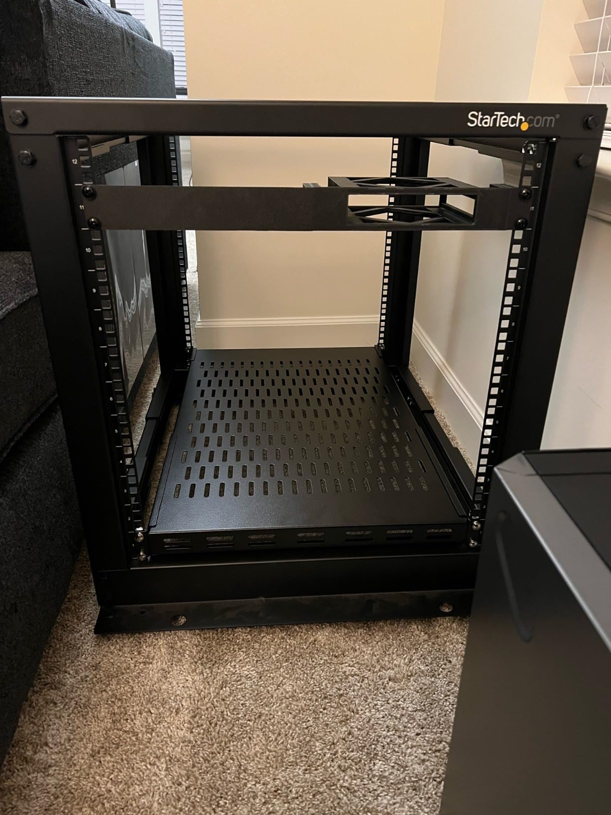 StarTech.com 1U 4-Post Server Rack Shelf, Vented, Adjustable Mounting Depth (28-34.4in/71.1-87.3cm), 150lb (68kg) Capacity, Black customer photo 2