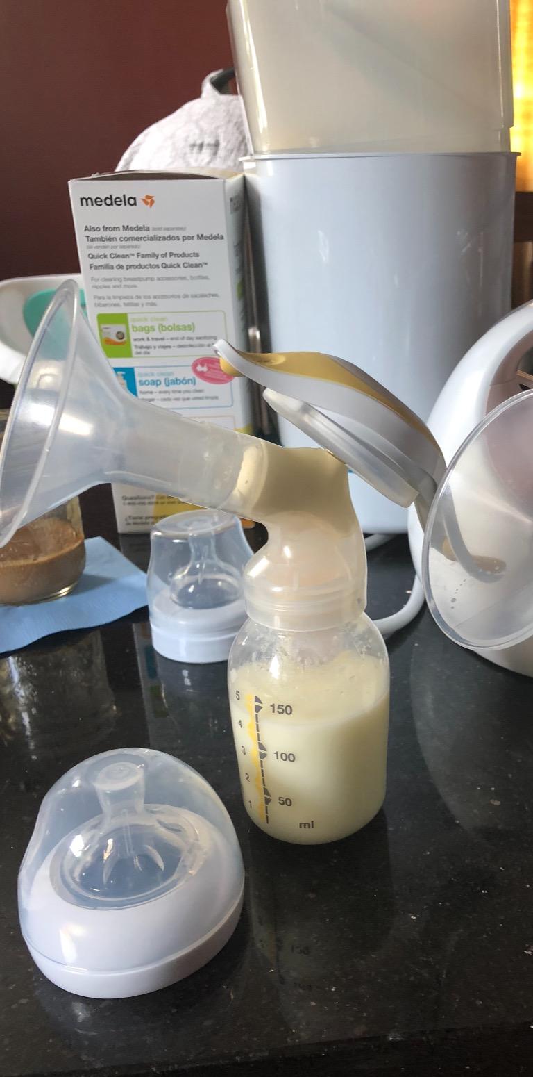 Medela Harmony Breast Pump, Manual Breast Pump, Portable Pump, 2-Phase Expression Technology, Ergonomic Swivel Handle, Easy to Control Vacuum, Designed for Occasional Use customer photo 1