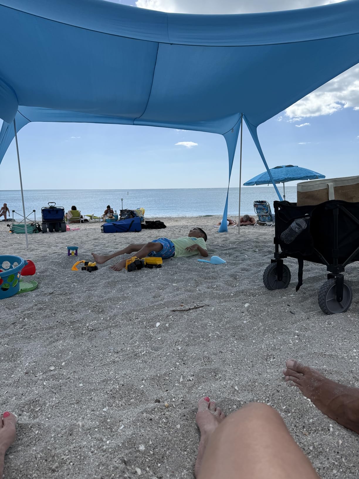 Rhino Valley Beach Tent, 10 x 10 FT Beach Shade UPF50+ Protection, Beach Canopy with 8 Sandbags 4 Stability Poles, Outdoor Beach Tent Sun Shelter Umbrella for Sand,Camping,Fishing Essentials, Sky Blue customer photo 1