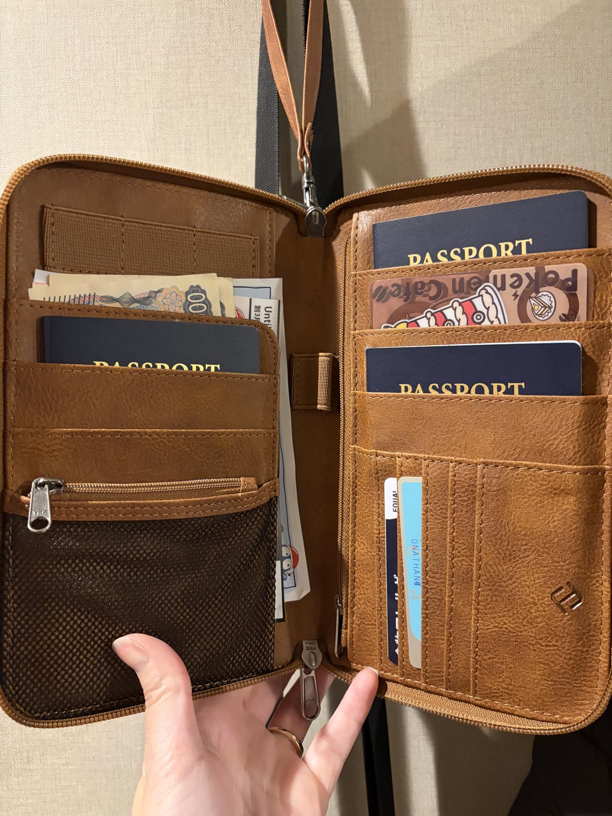 Family Passport Holder Wallet, RFID Blocking Travel Document Organizer customer photo 1