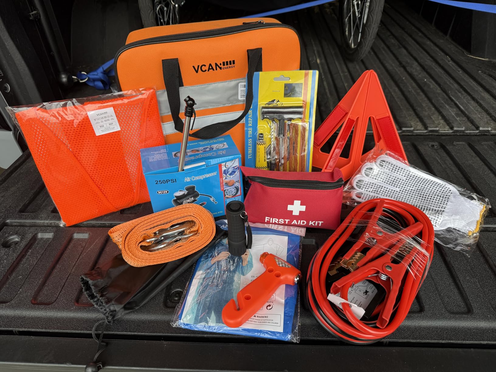 VCANENERGY Car Emergency Safety Kit Bag with Portable Air Compressor, Jumper Cables, First Aid Kit, Tire Pressure Gauge, Auto Vehicle Safety Road Side Assistance Kits Essentials, for Women, Men, Teen customer photo 1