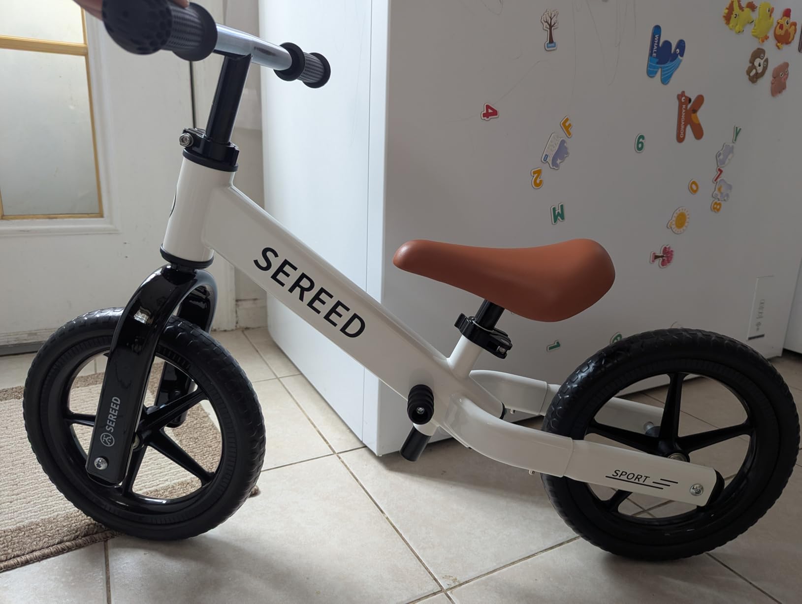 SEREED Toddler Balance Bike 2 Year Old, No Pedal Kids Toy Bike for 2-5 Years Old, Tool-Free Adjustment, Gift for 2-3 Boys Girls, Customize Plate with 3pcs Stickers (White) customer photo 1