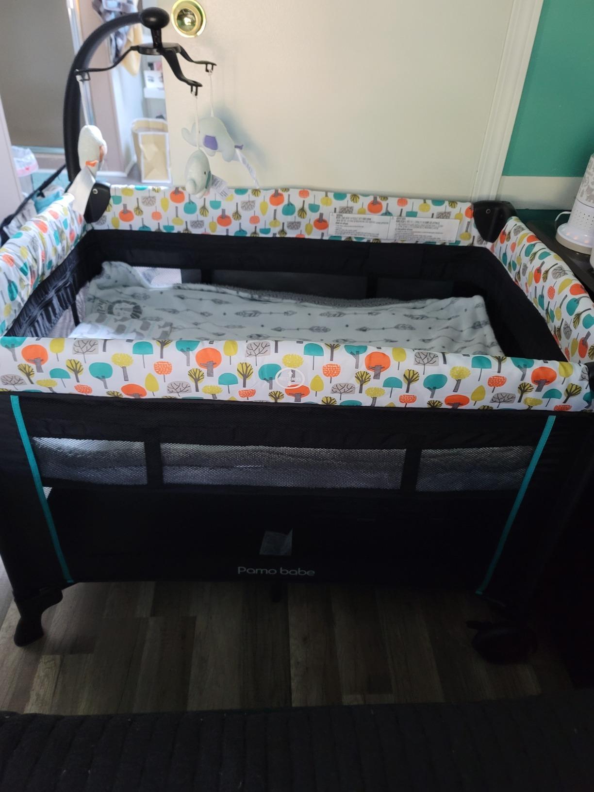 Pamo Babe 6 in 1 Baby Pack and Play with Bassinet - One-Step Setup Travel Crib with Changing Table, Toys Bar & Extra Large Storage Bag customer photo 1