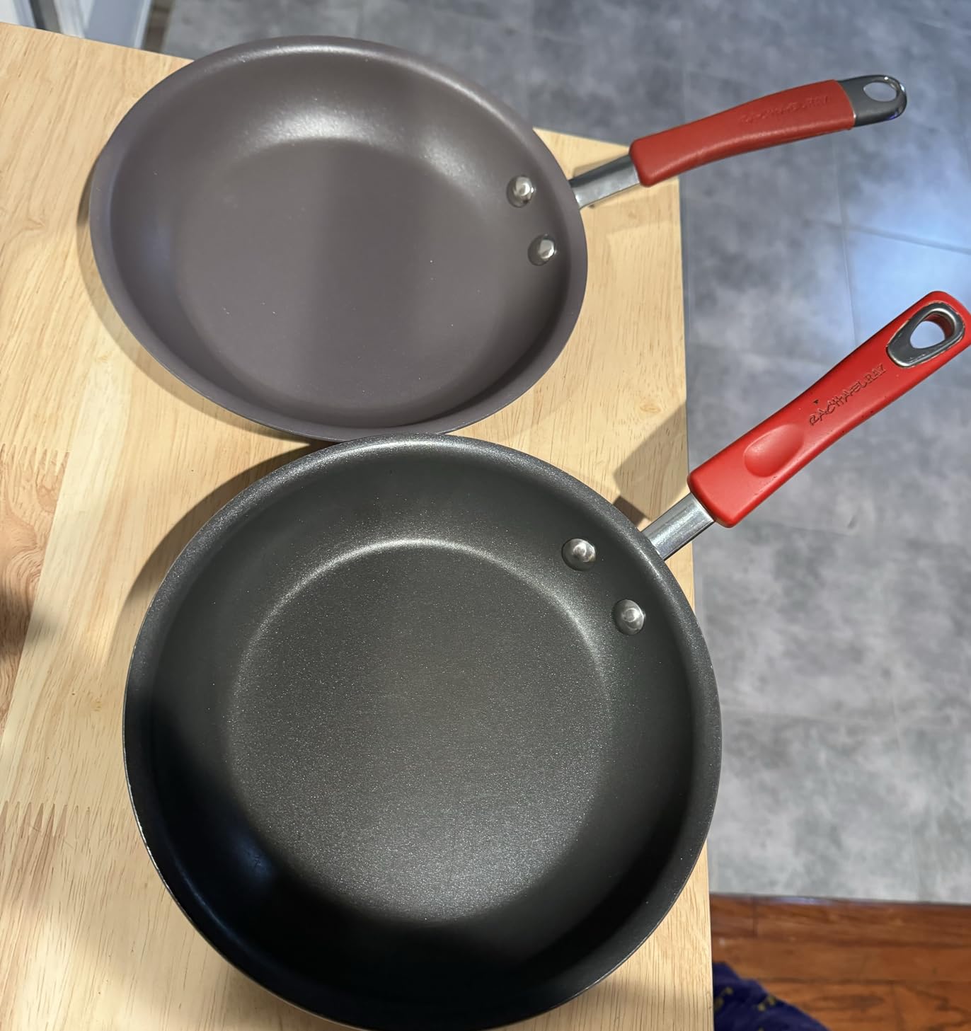 Rachael Ray Cucina Dishwasher-Safe Hard-Anodized Pots and Pans Set Non Stick Cookware, 12 Piece, Gray with Orange Handles customer photo 2