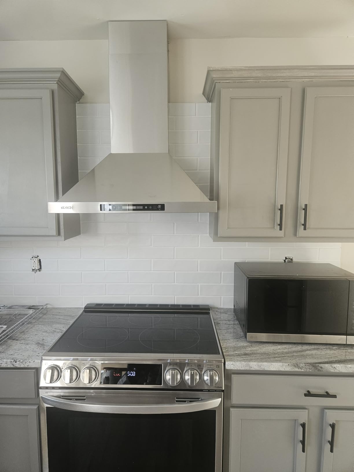 IKTCH 30-inch Wall Mount Range Hood 900 CFM Ducted/Ductless Convertible, Kitchen Chimney Vent Stainless Steel with Gesture Sensing & Touch Control Switch Panel, 2 Pcs Adjustable Lights (IKP02-30'') customer photo 2
