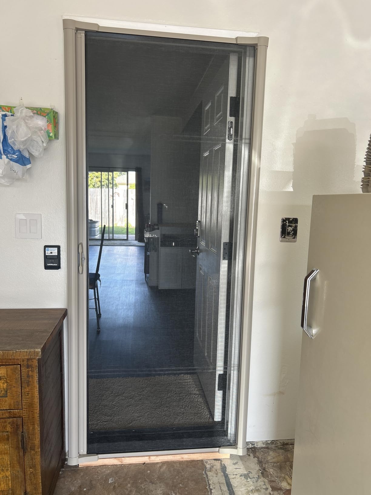 LARSON Brisa Single Sandstone Retractable Screen for Door with Thin Mesh Screen for High Visibility, Fits 80-in to 81-in Tall x 32-in to 36-in Wide Front Doors customer photo 1