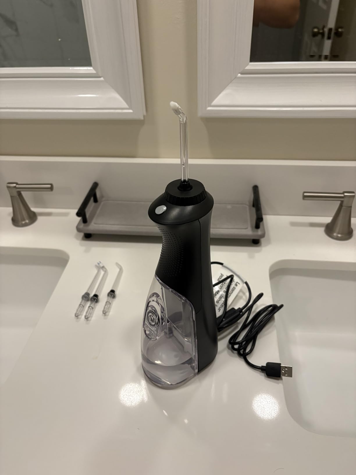 Waterpik Cordless Pearl Rechargeable Portable Water Flosser for Teeth, Gums, Braces Care and Travel, Extra Quiet, 4 Flossing Tips - ADA Accepted, WF-13 Black, Amazon Exclusive customer photo 1