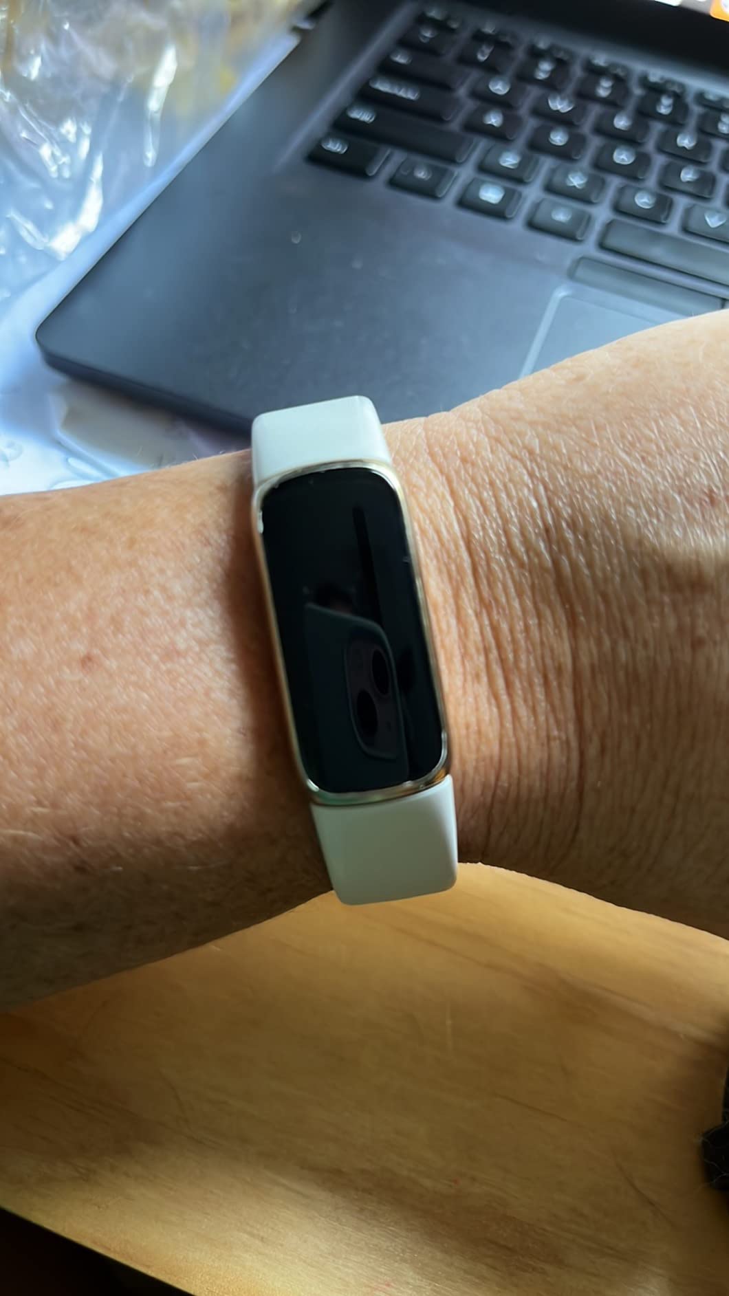 Fitbit Luxe Fitness and Wellness Tracker with Stress Management, Sleep Tracking and 24/7 Heart Rate, One Size S L Bands Included, Lunar White/Soft Gold Stainless Steel, 1 Count (Renewed) customer photo 2