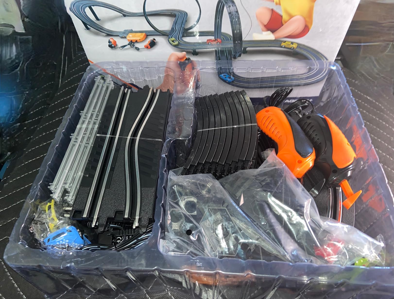 Slot Car Race Track Sets, 23ft Battery Powered or Electric Track with 4 Slot Cars, Dual Racing Game Lap Counters, Race Track Set Features a Loop, Turns, Straightaways and a Crossover for Boys Age 6-12 customer photo 1