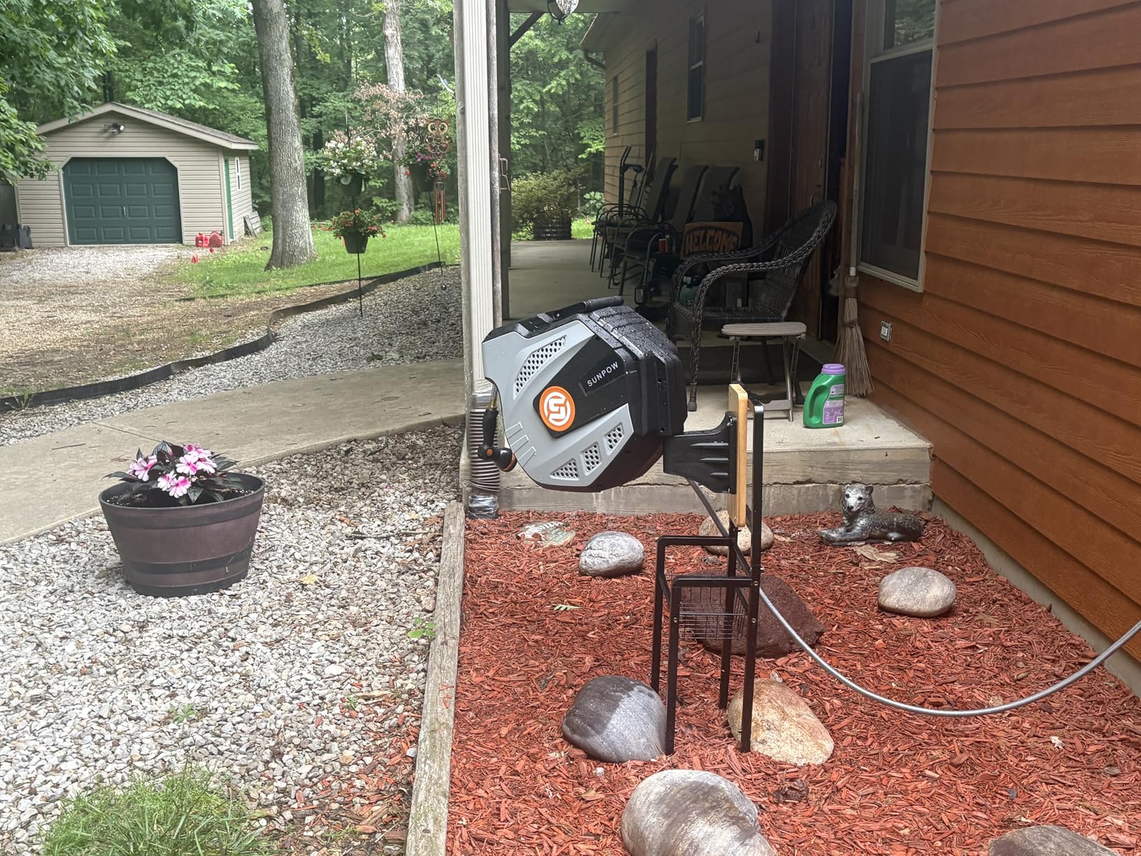 SUNPOW Retractable Garden Hose Reel - 1/2 inch x 50ft Heavy Duty Wall Mounted Hose Reel with 3/4 inch Brass Fitting & 10 Sprayer Nozzle - Any Length Lock, Auto Rewind System, 180deg Swivel Bracket- Grey customer photo 1