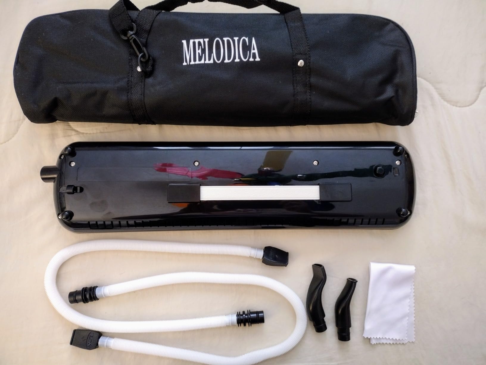 Tosnail 32 Key Melodica with Carrying Bag, Double Tubes Mouthpieces, Wipe Cloth, Air Piano Keyboard Musical Instrument for Beginners, Adults - Black customer photo 1