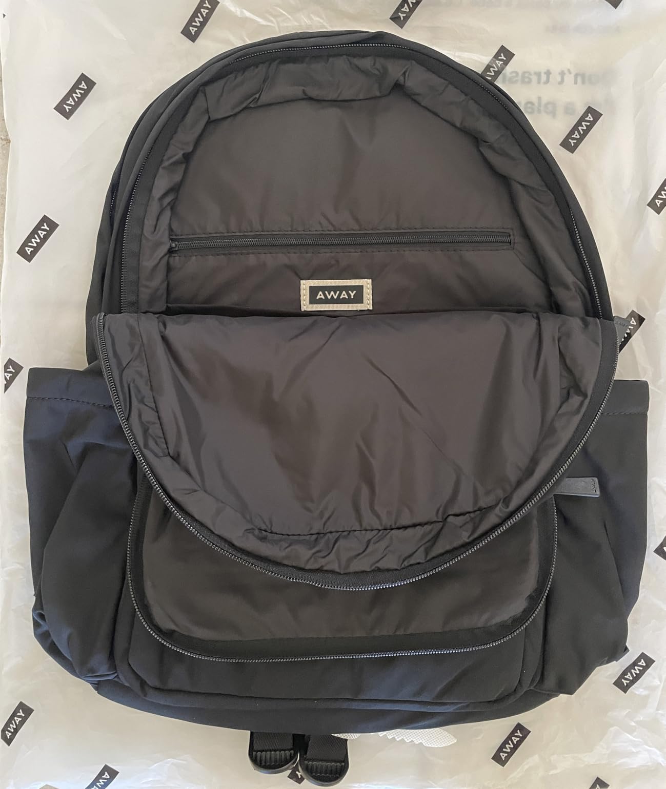 Away Featherlight Large Backpack for Travel & Work - Ergonomic Lightweight Bag with 16 Inch Laptop Sleeve, Passport Pocket & Trolley Sleeve, Jet Black customer photo 1
