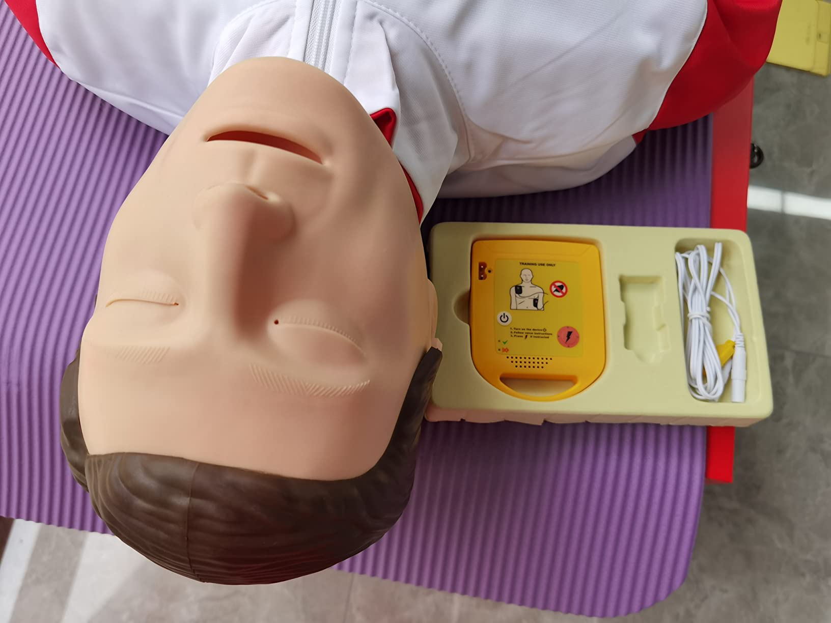 AED Trainer, AED Defibrillator Trainer Set CPR Training Device, English, Italian, French, Spanish Voice Prompts, 5 Different Scenarios (XFT-120NB) customer photo 2