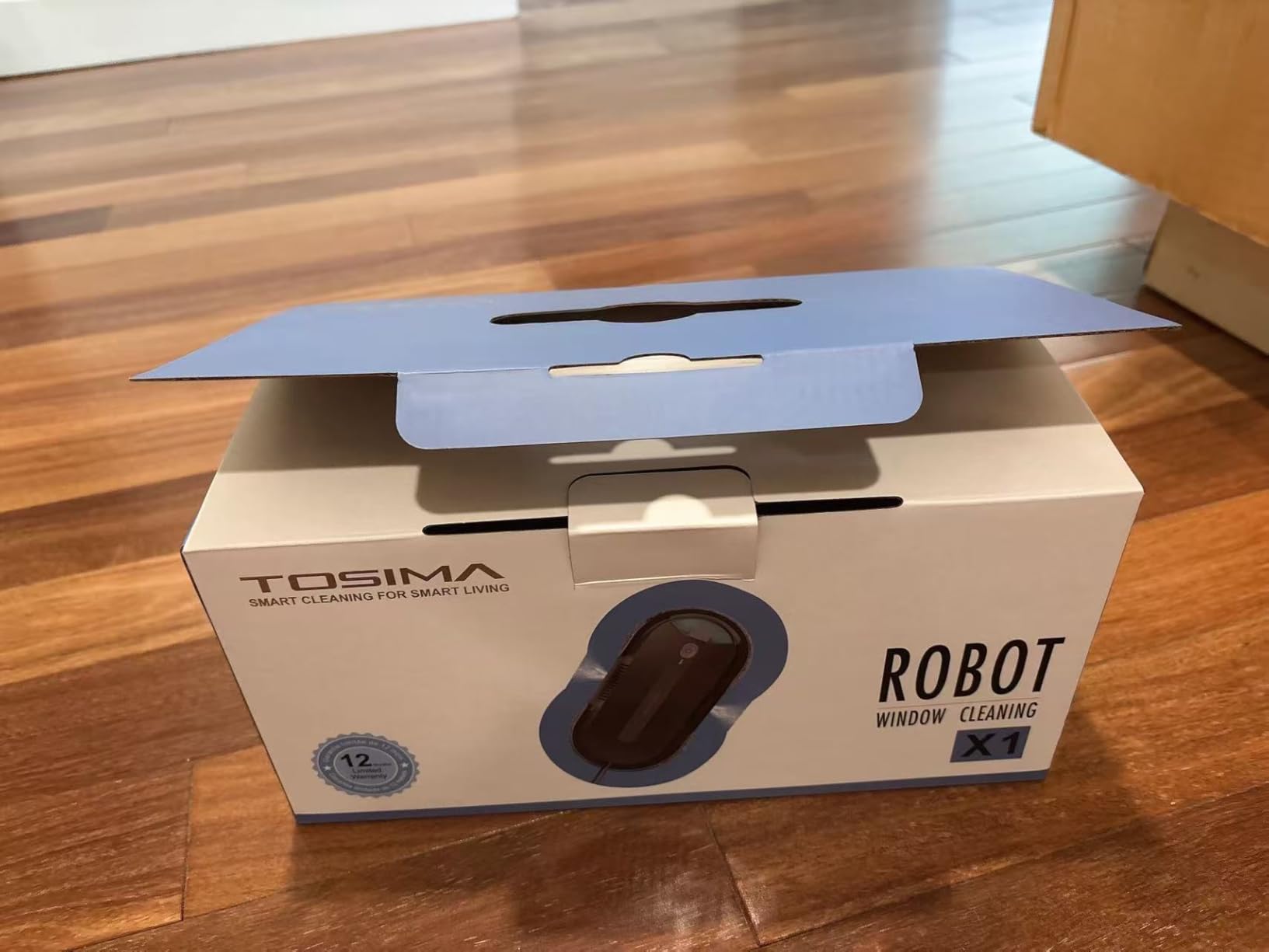 Tosima X1 Window Cleaning Robot, Dual Direction Auto-Spray Smart Window Cleaner with Triple Safety System, Smart Navigation, Remote Control, for All Smooth Surfaces, with 8 Rags, Black customer photo 2